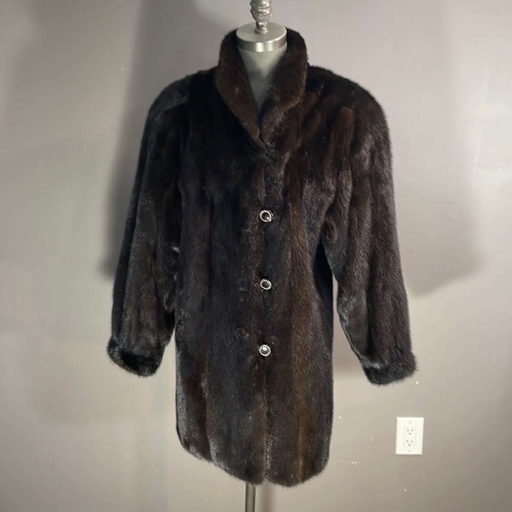Woman’s mink coat.  Gorgeous dark brown with natural sheen.  Shoulder pads.